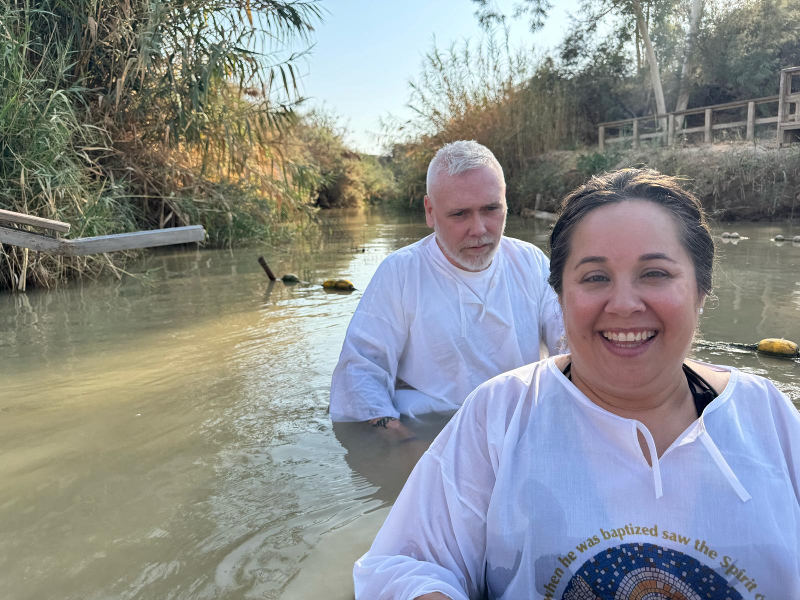 Pastor Michael Chamberlain participating in a river baptism