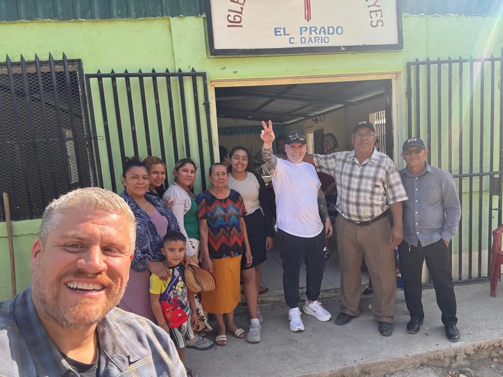 Mission team gathered with a local church community