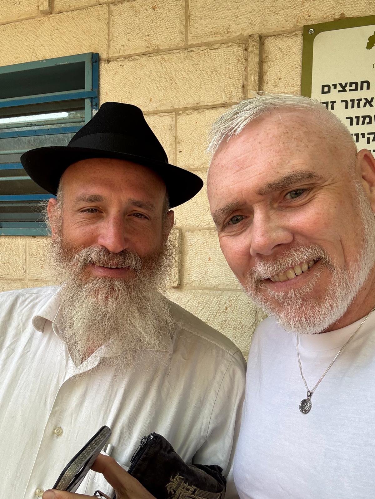 Pastor Michael Chamberlain with a Jewish man in Israel